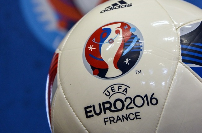 A football marked with the logo of the UEFA EURO 2016 is pictured in the city hall of Lens, northern France, as part of celebrations in the ten host cities of the EURO 2016 on June 11, 2015, as France marks one year to go until Europe's football event. AFP PHOTO / DENIS CHARLET